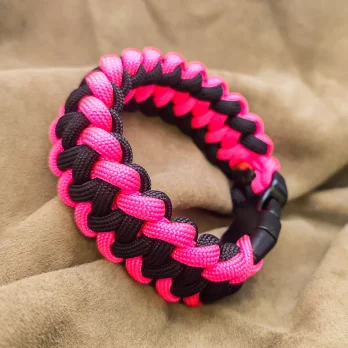 Bracelet de survie Shark Jaw noir/rose-néon